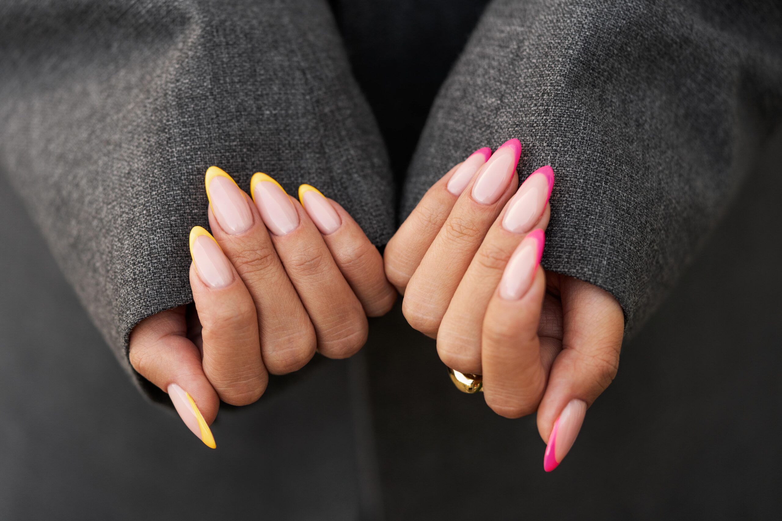 woman-showing-her-nail-art-fingernails-min